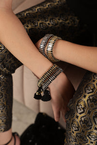 gold black bracelet, handwoven bracelet, artisan jewellery, sustainable jewellery, handmade bracelet, festive jewellery, women artisan jewellery, ethical jewellery, lightweight bracelet, bohemian jewellery, fair trade jewellery, Melrosia